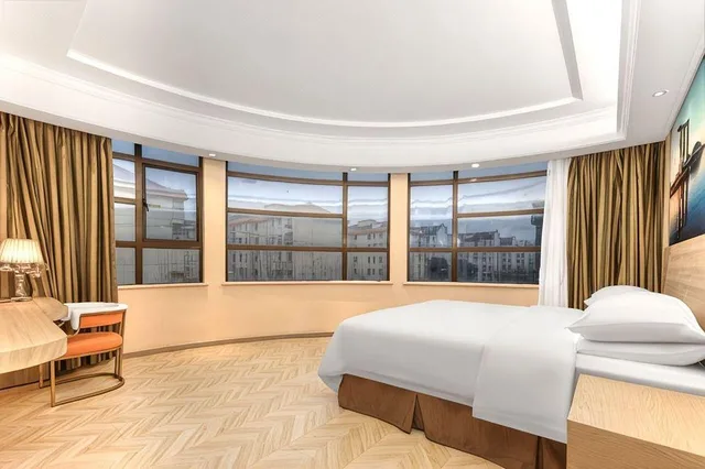 جناح ديلوكس بسرير كوين، Vienna Hotel (Shanghai Jing'an Gaoping Road) 1/1