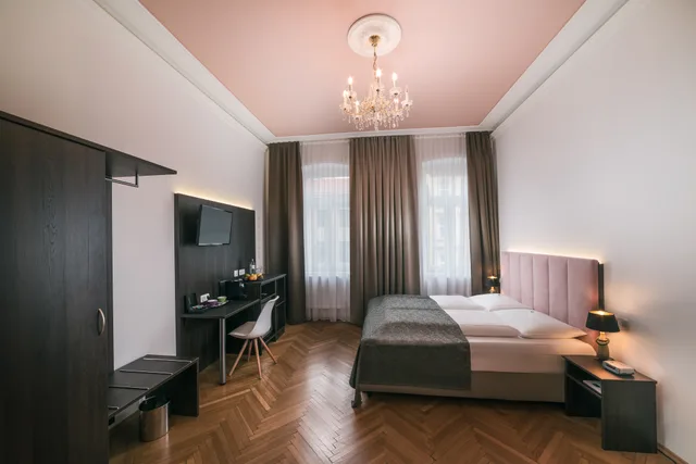 غرفة بسرير مزدوج أو سريرين منفصلين، Boutique Hotel Donauwalzer 4/10
