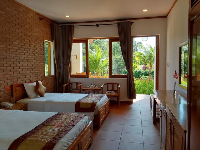 غرفة ديلوكس بسريرين منفصلين بإطلالة على الحديقة، The Garden House Phu Quoc 1/10