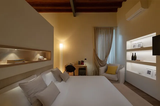 جناح سوبيريور بسرير كوين مع أريكة، Massimago Wine Suites 1/2