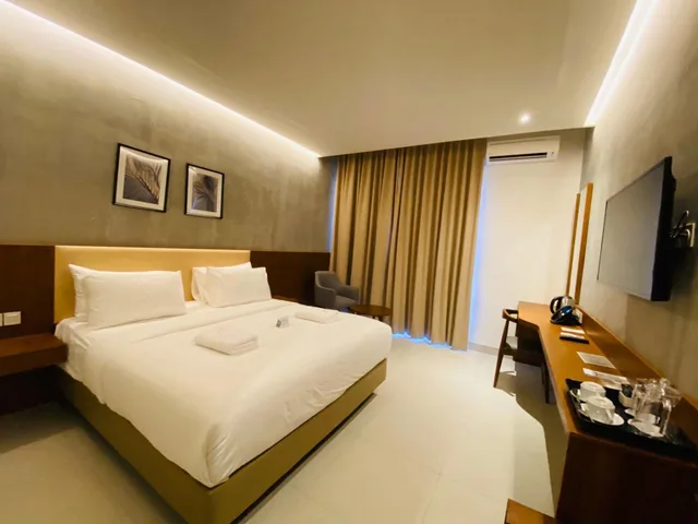 غرفة بسريرين منفصلين بإطلالة على الحديقة، Kambaniru Beach Hotel and Resort 2/2