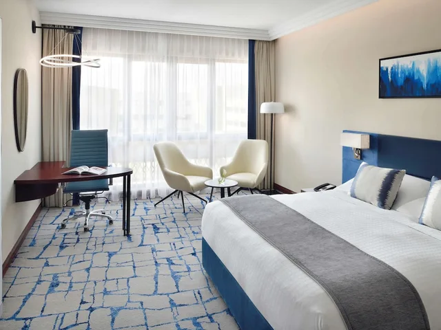 جناح ديلوكس بسرير كينج، Movenpick Bur Dubai 3/5