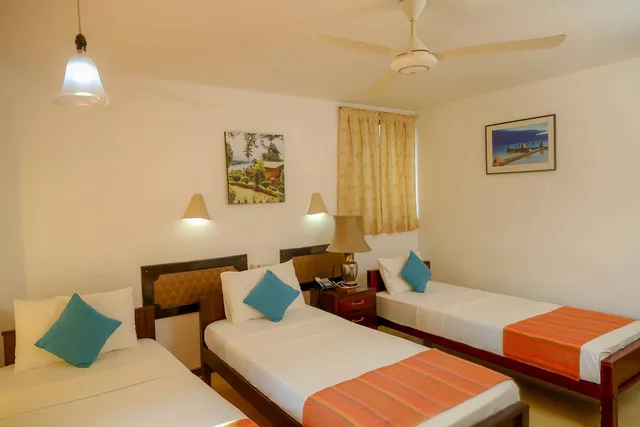 1 Bedroom, Deluxe, Triple, 1 King and 1 Single Beds, Lake View, Smoking, Oruthota Chalets 3/4