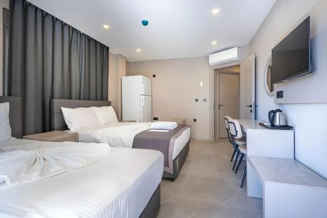 غرفة عائلية بسرير فردي بإطلالة على المدينة بغرفتي نوم، Lara Beach Homes 1/1