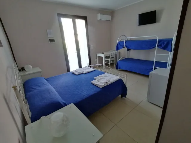 غرفة عائلية رباعية بأربعة أسرّة، Tenuta Pigliano 1/3