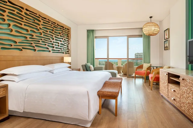 غرفة بسرير كينج بإطلالة على البحر بشرفة، SHERATON SANYA HAITANG BAY RESORT 1/6