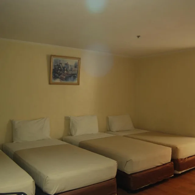 Deluxe Quadruple, Golden Peak Hotel and Suites powered by Cocotel 1/5
