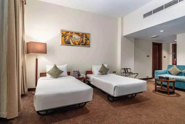 غرفة بسريرين منفصلين، Ramada By Wyndham Deira 3/5