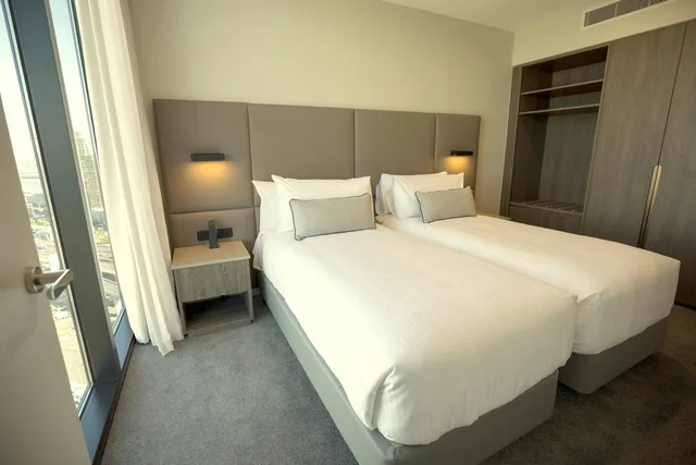 غرفة ديلوكس بسرير فردي، Oakwood Premier Melbourne 1/5