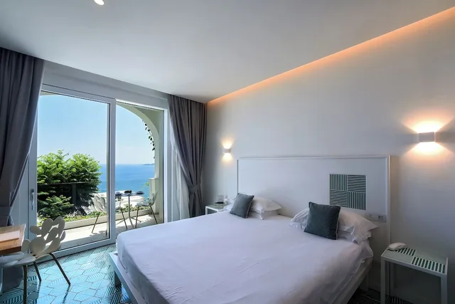 غرفة سوبيريور ديلوكس بسرير كوين بإطلالة على البحر، Montemare Hotel 1/4