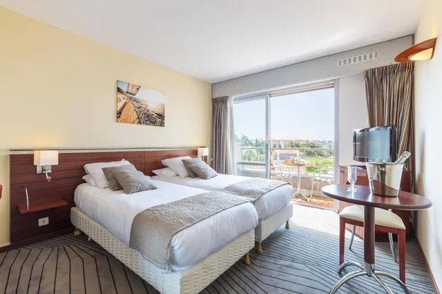 Comfort, Double or Twin Bed, Balcony or Terrace, Pool Access، Brise de Mer 4/10