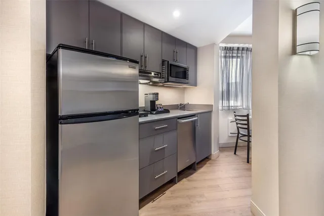 جناح بسريرين كوين بمنطقة جلوس، Best Western Plus Ottawa City Centre 9/9
