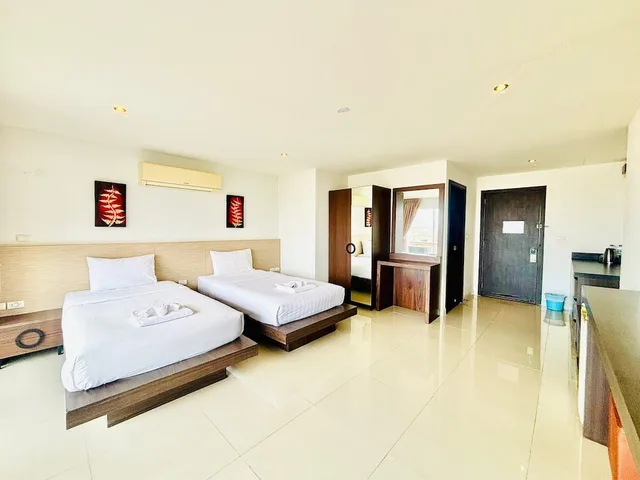 Sunset, Twin Beds، Oceanview Treasure Hotel & Residence 1/6