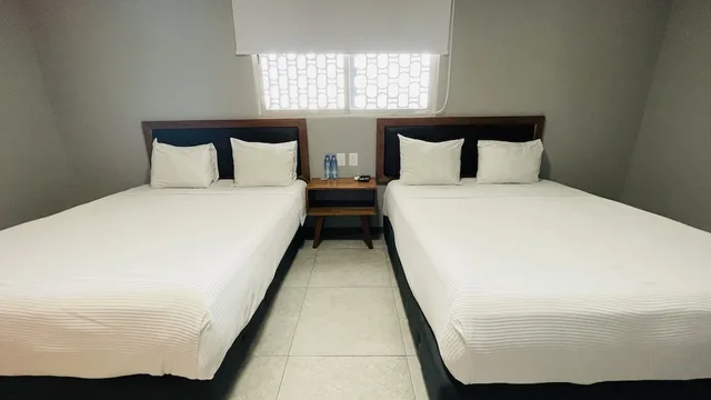 غرفة رباعية بسريرين مزدوجين، Hit Merida Hotel Boutique 2/4