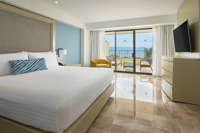 جناح بسرير كينج بغرفة نوم واحدة مع أريكة، Marriott Puerto Vallarta Resort and Spa (ex Casa Magna Marriott Puerto Vallarta Resort and Spa) 1/2