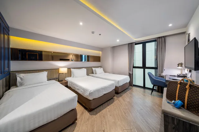 غرفة ديلوكس ثلاثية بثلاثة أسرّة، Vince Hotel Bangkok Pratunam 1/2