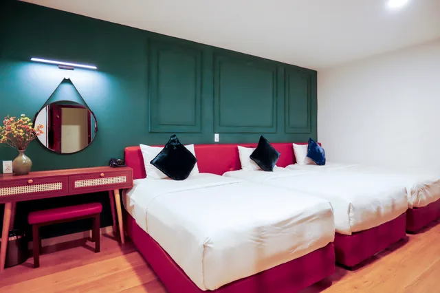 غرفة بريميوم بسرير مزدوج أو سريرين منفصلين، M Village Premier Hotel Thi Sach, a brand of Modern Village Lifestyle 1/3