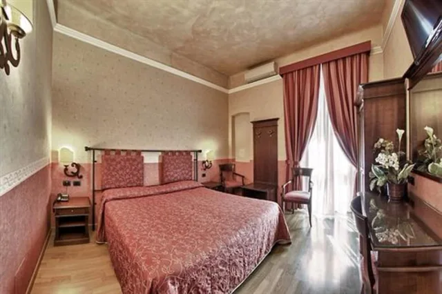 غرفة رباعية، Hotel Pedrini 1/7