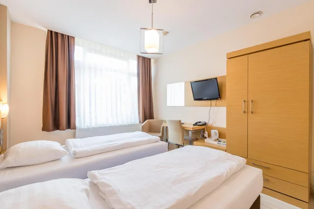 غرفة بسرير مزدوج أو سريرين منفصلين، Hotel Port 1/10