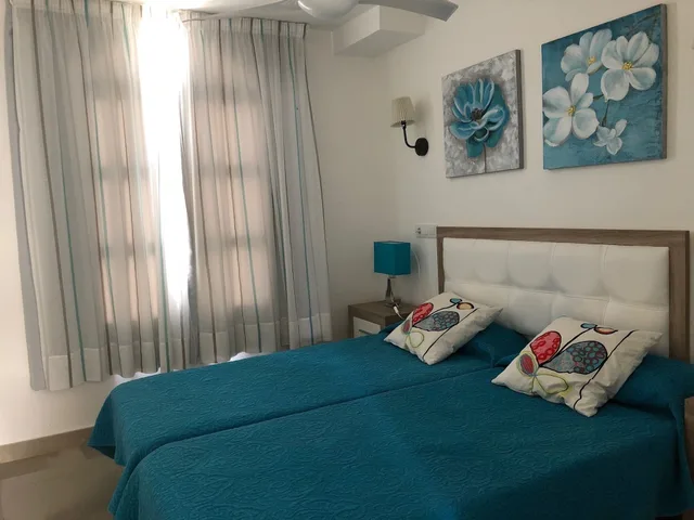 شقة بسرير مزدوج وسريرين منفصلين بشرفة بغرفتي نوم في الطابق العلوي، La Venecia de Canarias 4/7