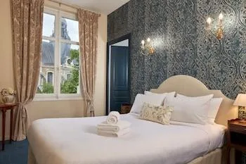 غرفة كلاسيكية ثلاثية، Hotel France Et De Guise 1/2
