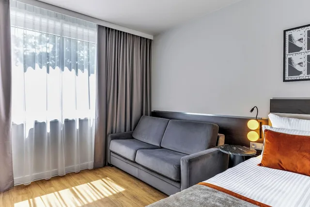 غرفة عائلية بسرير كينج مع أريكة، Leonardo Hotel Hannover Medical Park 10/10