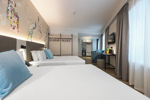 غرفة عائلية بسريرين كوين، iH Hotels Milano Centrale 1/8
