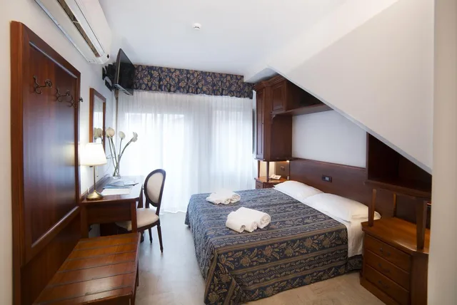 غرفة اقتصادية بسرير مزدوج أو سريرين منفصلين، Hotel La Giara 1/2