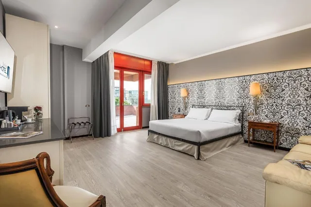 غرفة ديلوكس بشرفة، Citystyle Hotel Reggio Emilia 3/8
