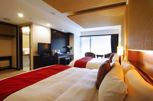 غرفة ديلوكس رباعية بسريرين كوين بحوض استحمام، Yangmingshan Tien Lai Resort Spa 1/4