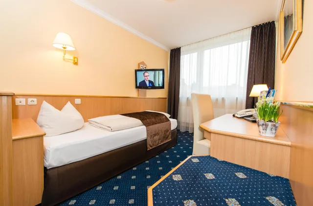 غرفة مفردة، Hotel Royal 4/12