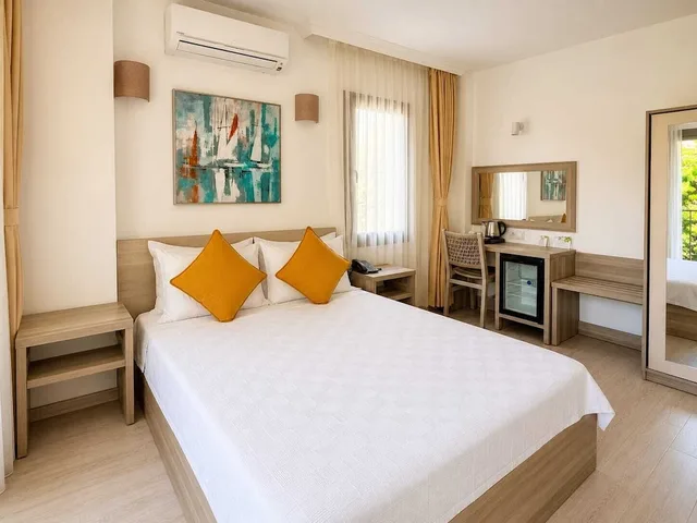 غرفة بسريرين منفصلين بإطلالة على الحديقة والمسبح، Aria Doria Otel 1/10