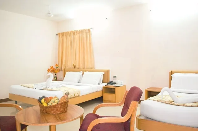 غرفة قياسية رباعية بسريرين كوين، HOTEL RAJADHANE 4/9