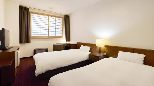 غرفة غربية بسريرين منفصلين في المبنى الرئيسي، Kujukushima Bayside Hotel & Resort Flags 1/1