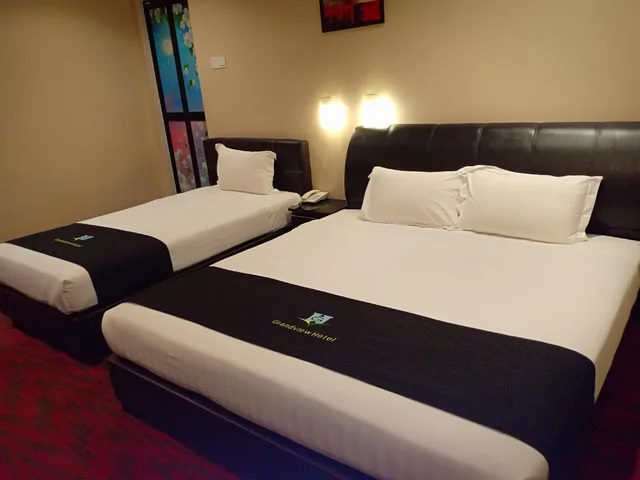 غرفة ديلوكس ثلاثية بسرير كينج وسرير فردي، Grandview Hotel 2/2
