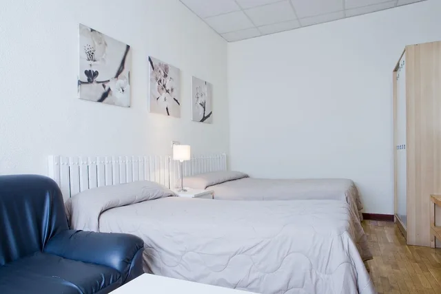 غرفة رباعية بأربعة أسرّة، Hostal America 1/3