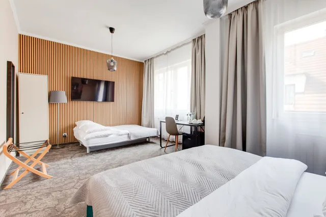 غرفة رباعية بسرير مزدوج مع أريكة، Andante Hotel 7/10