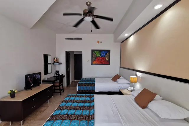 غرفة قياسية رباعية بإطلالة، Coral Island Hotel and Spa 2/6