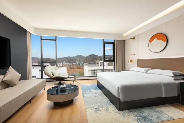 غرفة تنفيذية بسرير كينج، Days Inn by Wyndham Enshi Gaoping 1/3