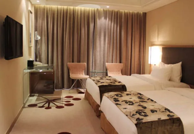 غرفة بسريرين منفصلين بإطلالة على الحديقة، Fliport Garden Hotel Fuzhou 2/4