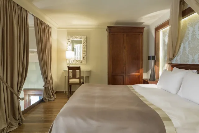 جناح بسرير كوين بغرفة نوم واحدة مع أريكة، Casa Delfino Suites 2/10
