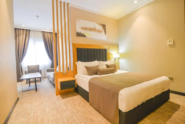 غرفة ديلوكس مع أريكة، Serenity Comfort Hotel 1/2