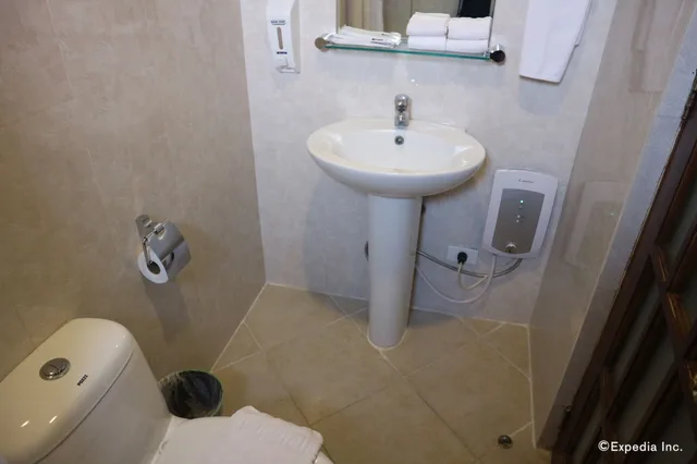 غرفة ديلوكس بسرير كينج، DISCOVER BORACAY HOTEL AND SPA 8/8