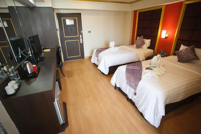 غرفة قياسية بسريرين منفصلين، Grand Pink Hotel Hat Yai 4/5