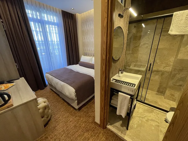 غرفة قياسية بسرير كوين، Weingart Seaside Hotel 5/5