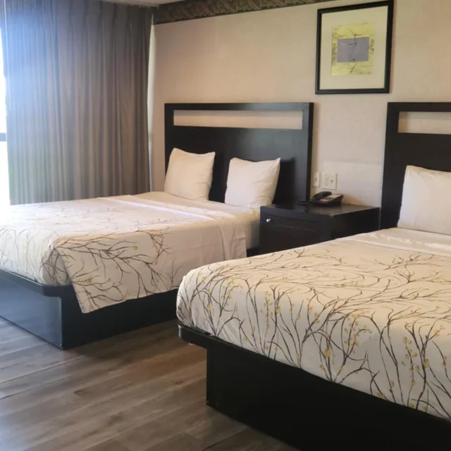 غرفة داخلية بسريرين كوين، Valley Inn 7/9