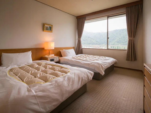 Japanese Western, Twin Beds, Tatami, Side Nile View، Iwakuni Kokusai Kanko Hotel 1/1
