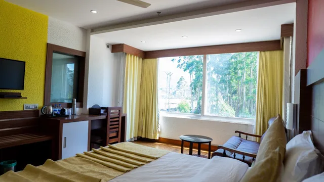 غرفة بريميوم بسرير كينج، Hill View Munnar 2/2