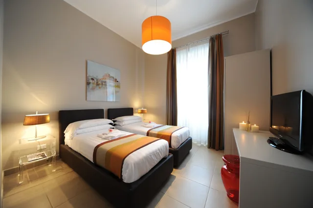 شقة بسريرين منفصلين بغرفتي نوم مع أريكة، Residence Trianon Borgo Pio 1/8