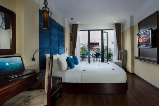 غرفة متصلة ديلوكس عائلية بشرفة، Ambassador Hanoi Hotel & Travel 1/1
